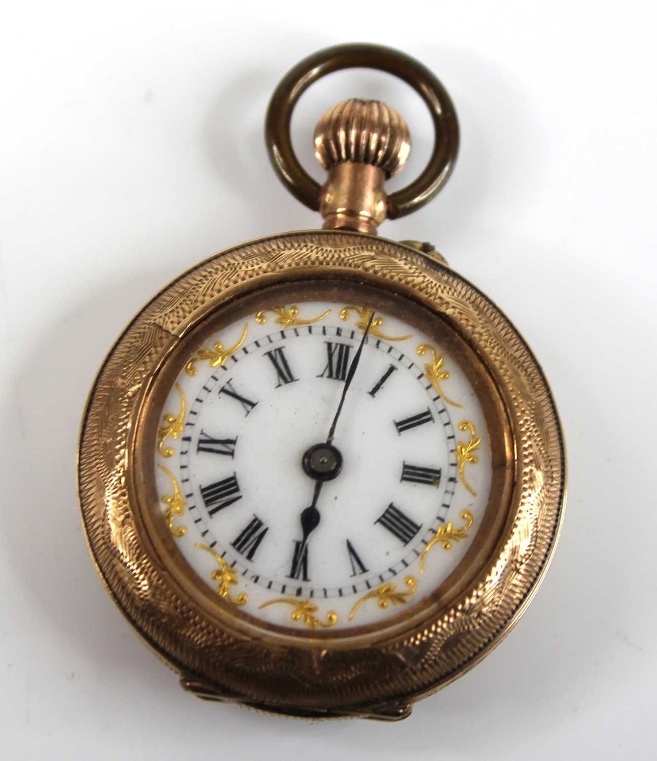 A continental lady's 9ct gold cased fob watch, the case with all-over engraved decoration, white