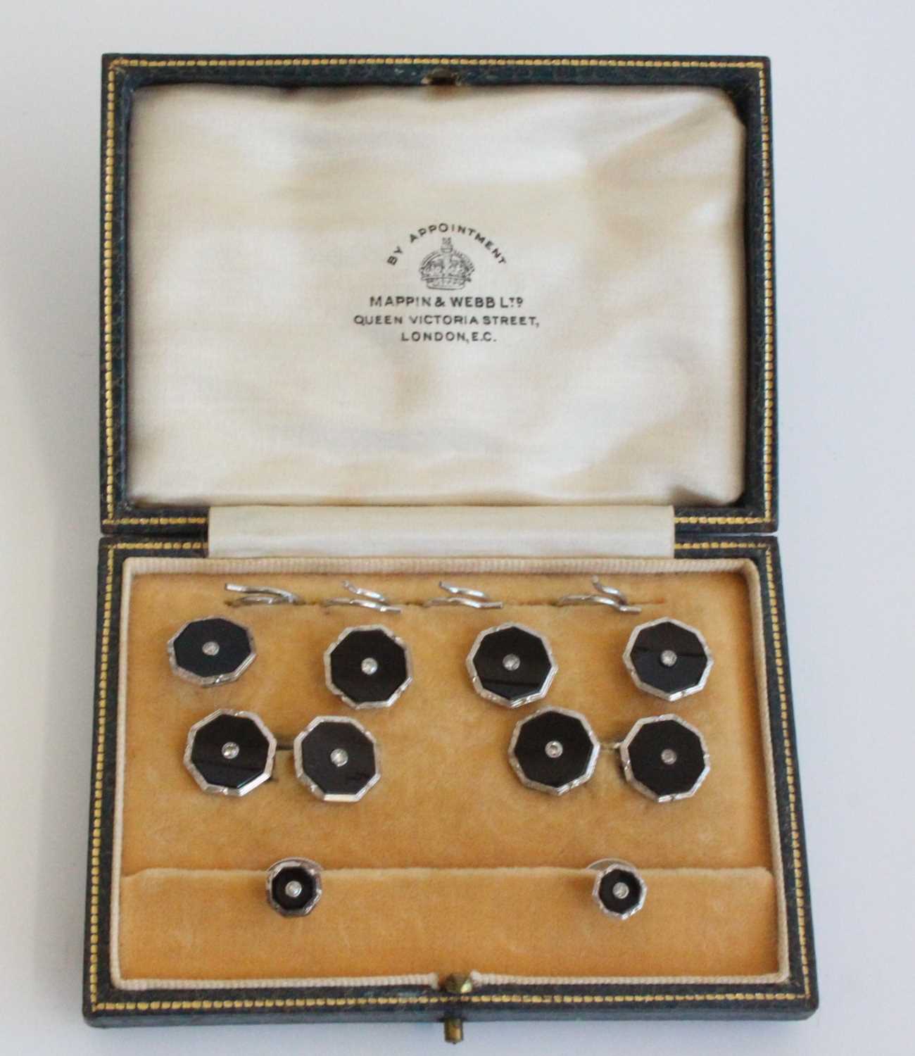 A Mappin & Webb gent's white metal, black onyx and diamond dress set, in fitted case, comprising
