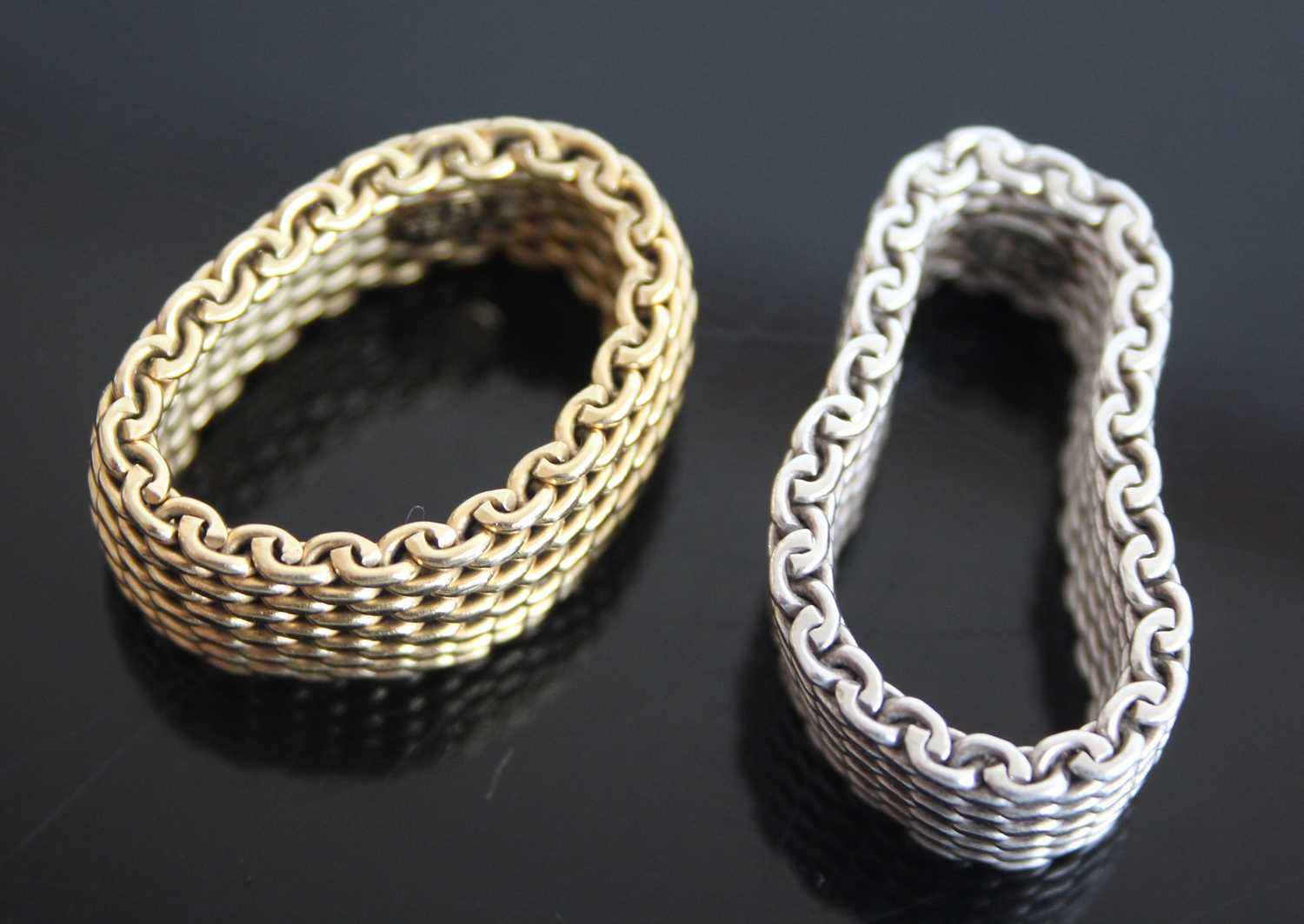 Two marked Tiffany & Co rings. One yellow metal 10mm wide mesh link ring, finger size T approx. - Image 3 of 4