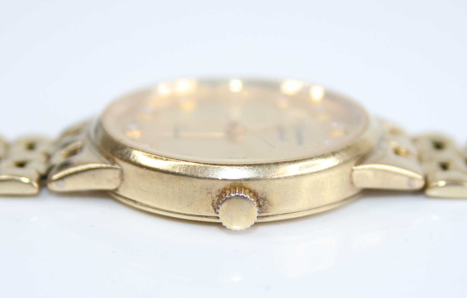 W. Croxton of England - a lady's 9ct gold cased quartz bracelet watch, having a signed gilded - Image 4 of 5