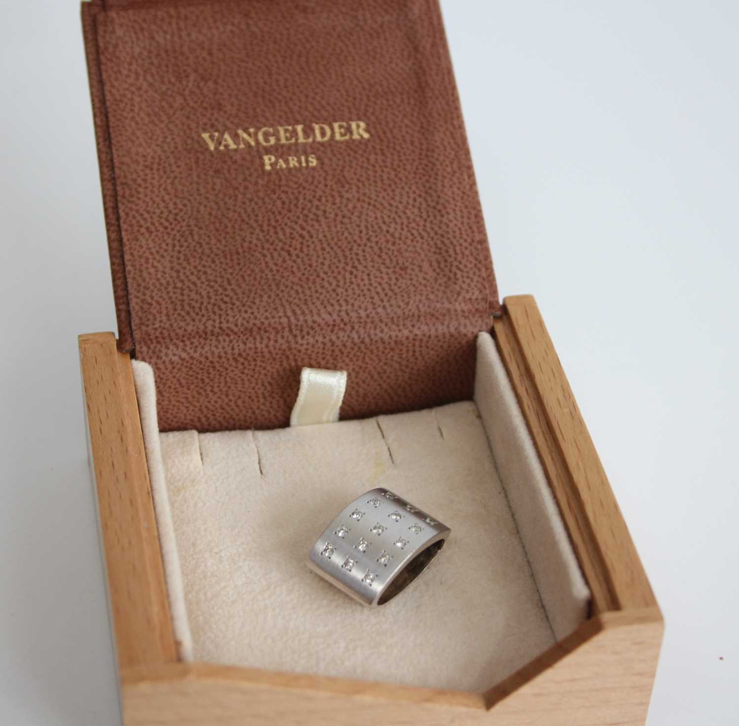 David Vangelder of Paris - a white metal and diamond pendant, of elliptical form, flush set with - Image 5 of 5