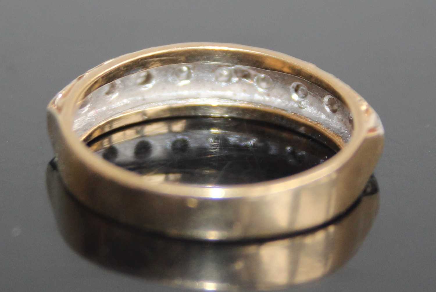 A 9ct gold diamond half eternity ring, arranged as nine small round cuts in a carved setting, - Image 3 of 7