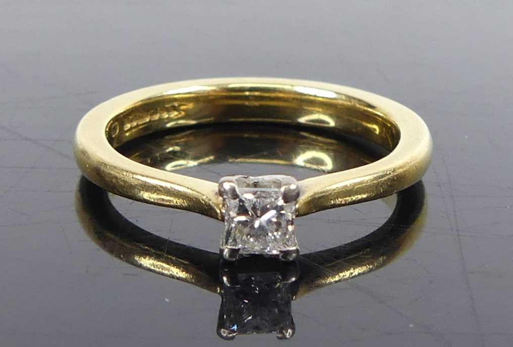 An 18ct yellow and white gold diamond solitaire ring, comprising a princess cut diamond in a four- - Image 2 of 7