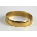 An 18ct gold court shaped wedding band, sponsor HS, 2.2g, size N