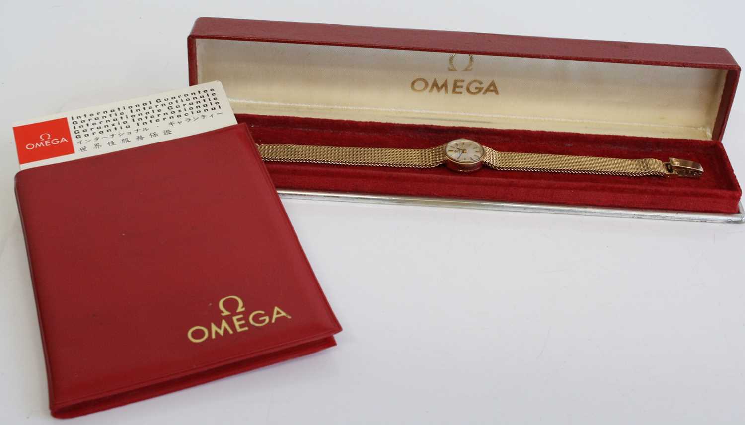 A lady's 9ct yellow gold Omega manual wind wristwatch with round silver baton dial and integral - Image 7 of 7