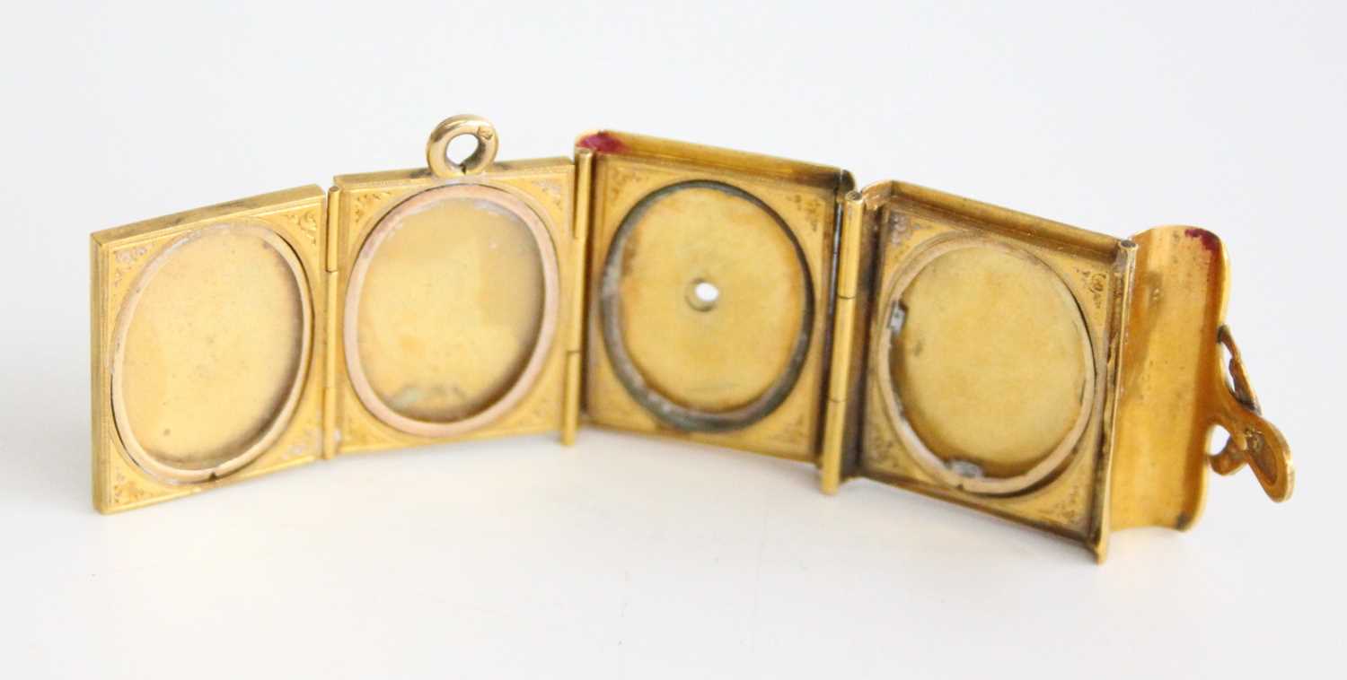 A late 19th century pendant locket in the form of a book, having concertina action to allow four - Image 2 of 5