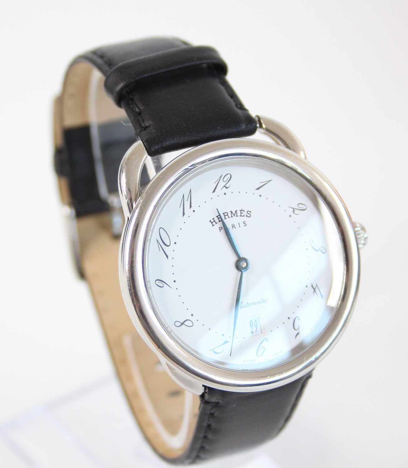 A steel Hermes automatic wristwatch, having round white Arabic dial and date at six, fitted to a - Image 3 of 8