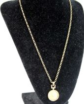 A Victorian gold half sovereign, 1892, in 9ct gold pendant and on 9ct gold belcher link neck chain