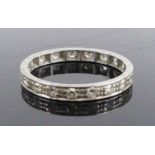 A white metal diamond full hoop eternity ring, comprising 19 single cut diamonds in grain and