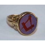 A Victorian style 9ct gold and agate set masonic signet ring, the agate setting measuring 15 x 12mm,