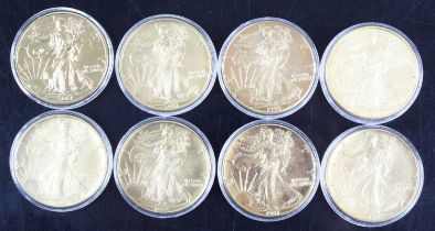 United States of America, a collection of eight 1oz fine silver dollars, dates to include 1987,