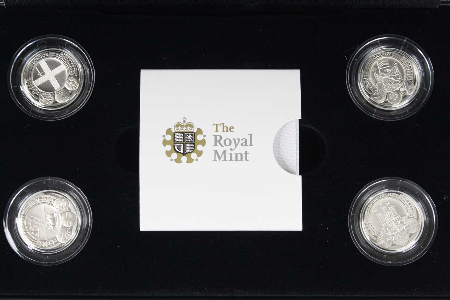 The Royal Mint, a collection of four silver proof £1 coins to include Belfast and London (2010) - Image 2 of 2