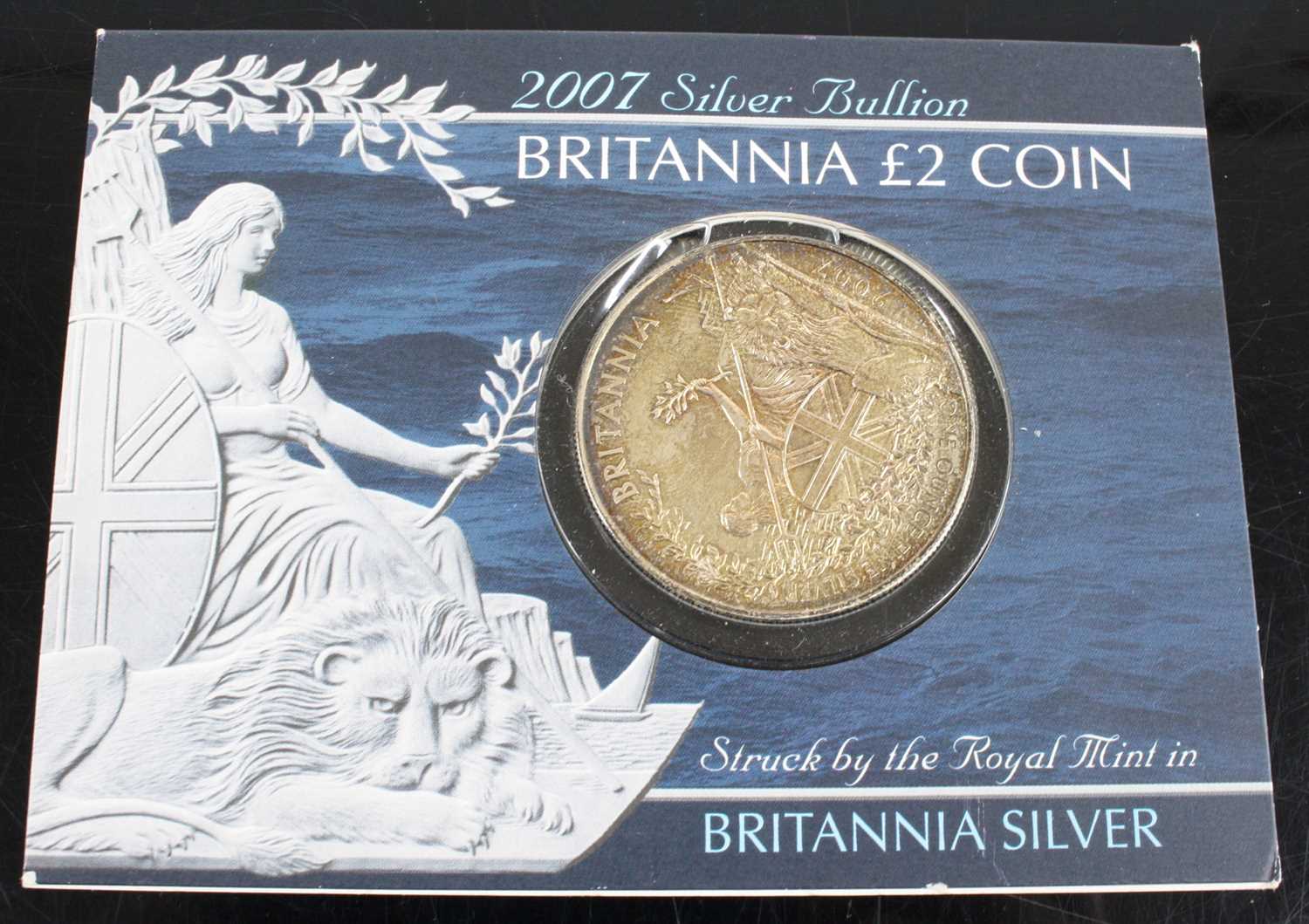 United Kingdom, The Royal Mint, 2007 Silver Bullion Britannia £2 Coin, in card sleeve, together with