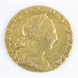 Great Britain, 1762 gold quarter guinea, George III laureate bust right, rev: crowned garnished