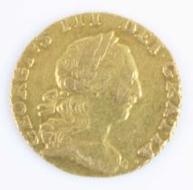 Great Britain, 1762 gold quarter guinea, George III laureate bust right, rev: crowned garnished