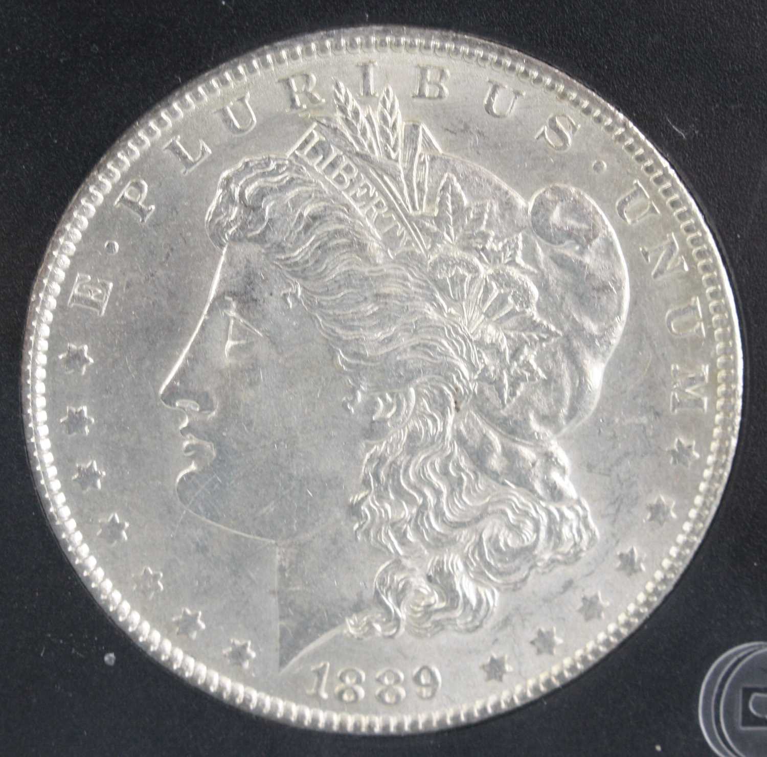 United States of America, 1889 Uncirculated Morgan dollar, obv: Liberty head left date below rev: - Image 2 of 5