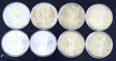 United States of America, a collection of eight 1oz fine silver dollars, dates to include 1986,