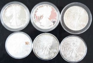 United States of America, a collection of six 1oz fine silver dollars, dates to include 1986,