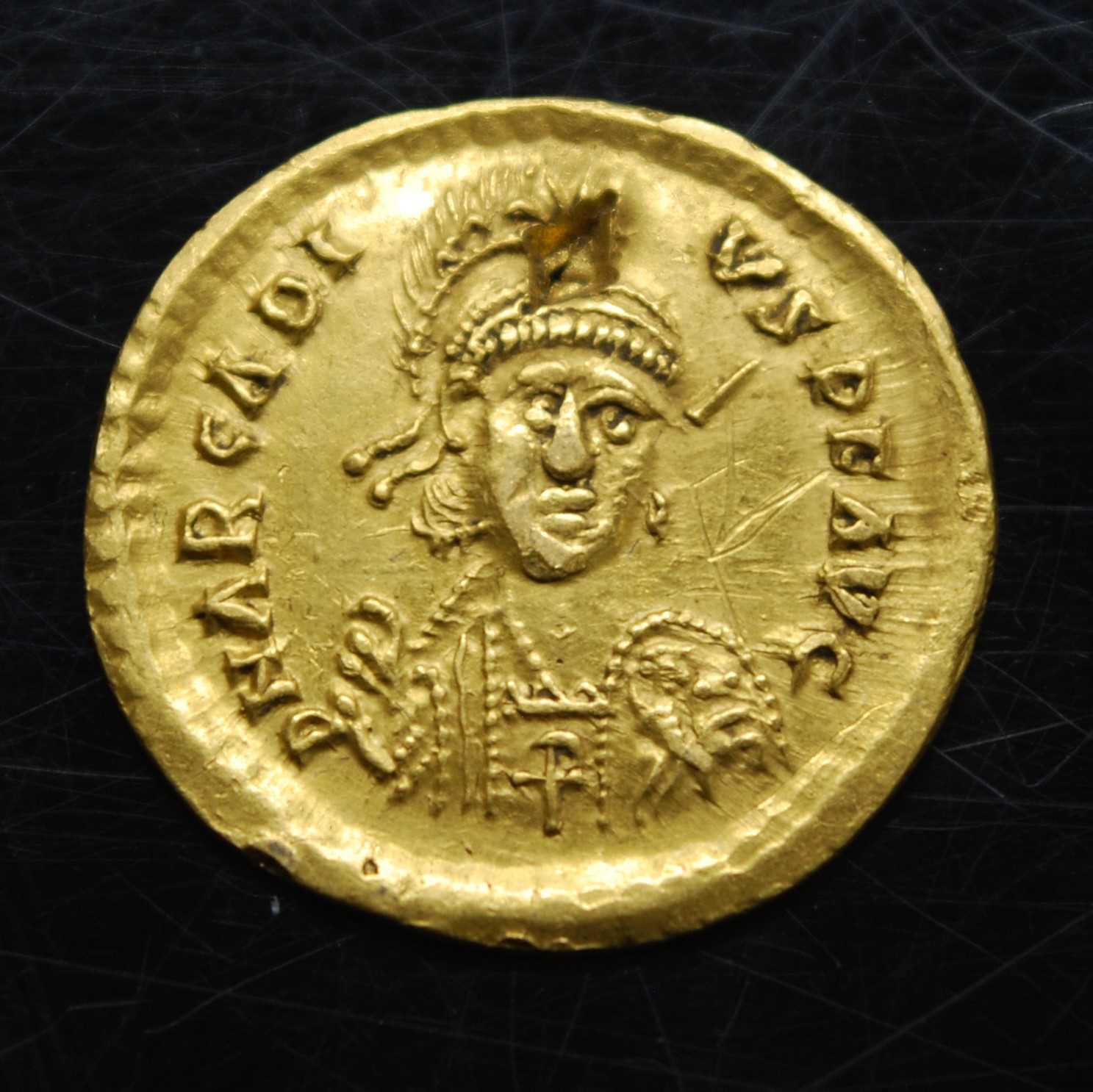 Western Roman Empire, Honorius (AD 393-423) gold solidus, obv; bust of Honorius, helmeted, shield