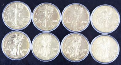 United States of America, a collection of eight 1oz fine silver dollars, dates to include 1988,