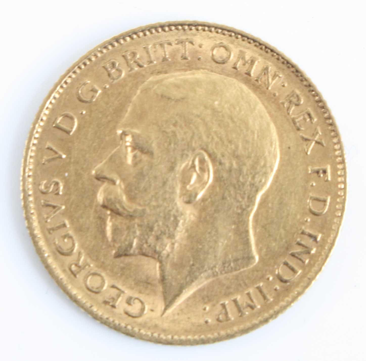 Great Britain, 1911 gold half sovereign, George V, rev: St George and Dragon above date. (1)