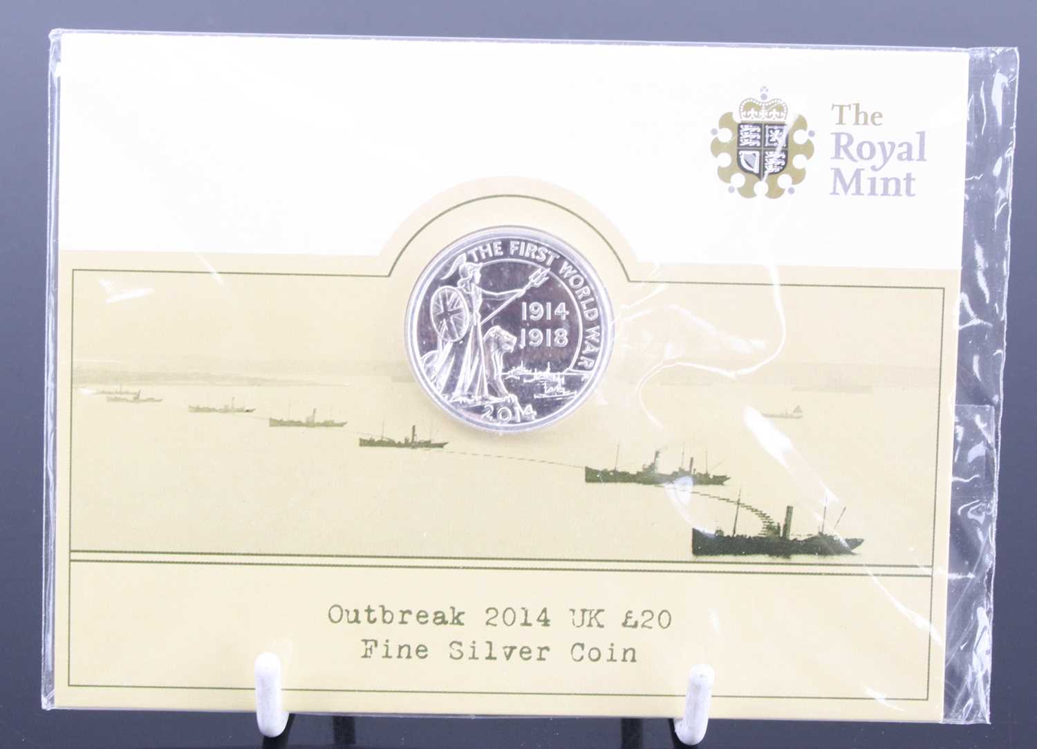 United Kingdom, The Royal Mint, Outbreak 2014 Fine Silver Coin, together with The Christmas Nativity