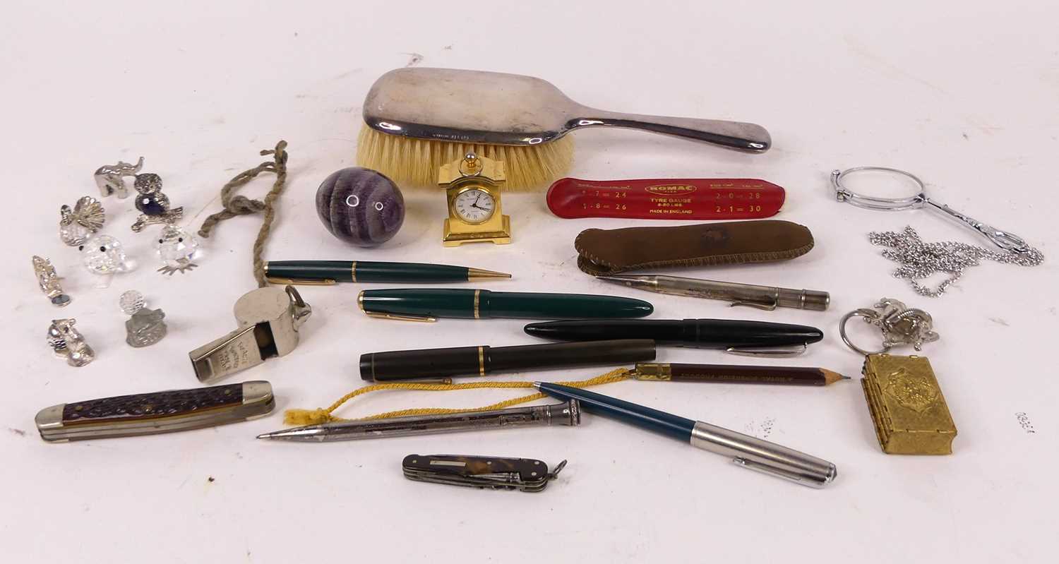 Miscellaneous items to include a silver clad dressing table brush, four wristwatches, Swarovski
