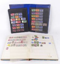 A mid-20th century stamp album and contents, to include examples from Guernsey, the Philippines,