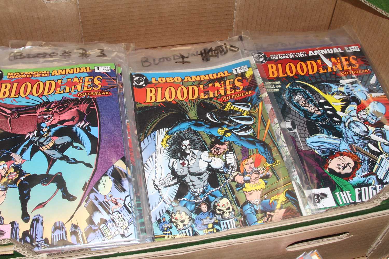 A collection of DC comic books to include Bloodlines