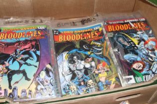 A collection of DC comic books to include Bloodlines