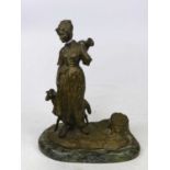 After Joseph D'Aste, a bronze figural inkwell in the form of a lady holding a water jug, modelled