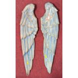 A pair of carved pine and polychrome painted wings, height 79cm