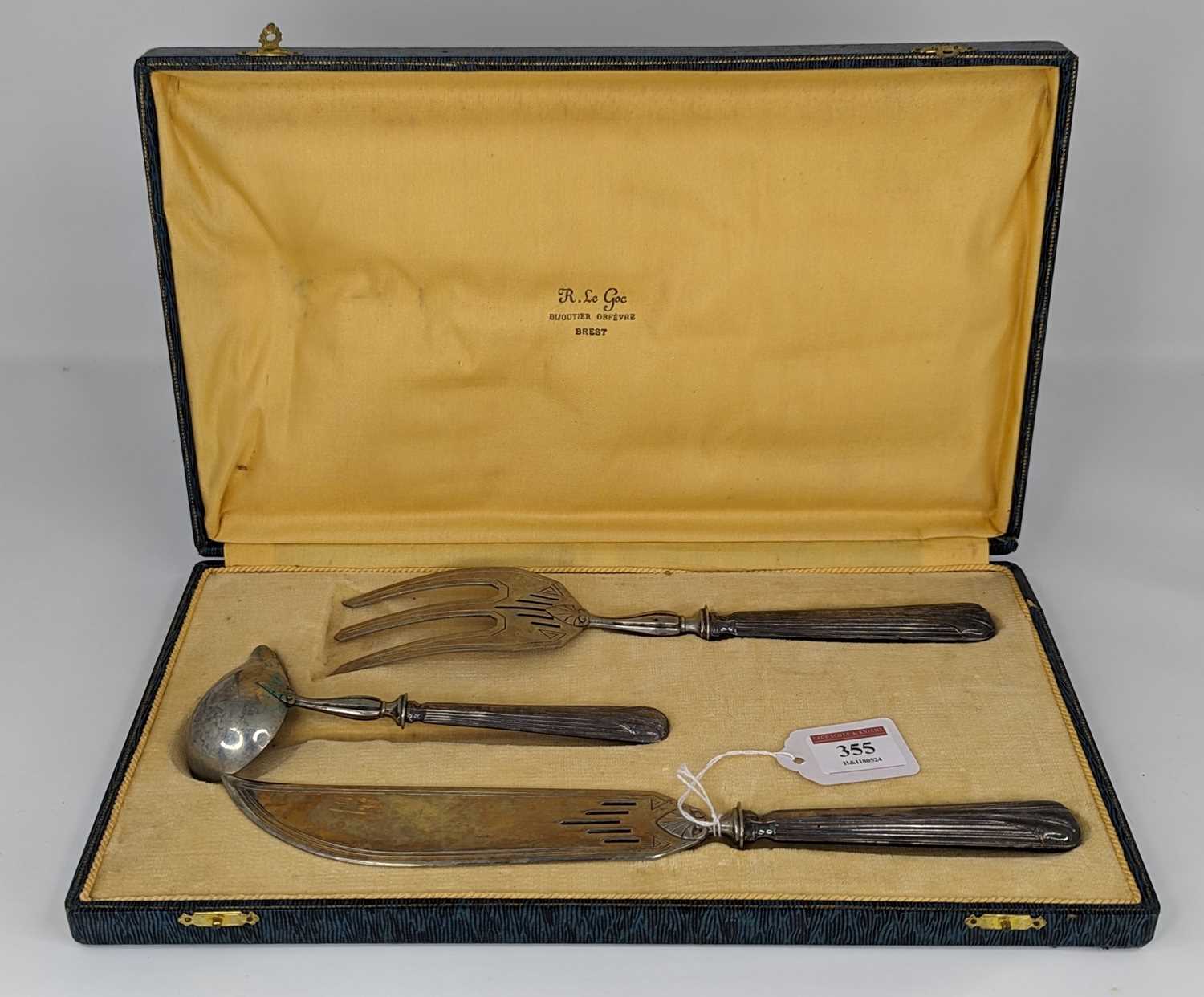 A mid 20th century French three-piece serving set, to include three pronged fork, knife and