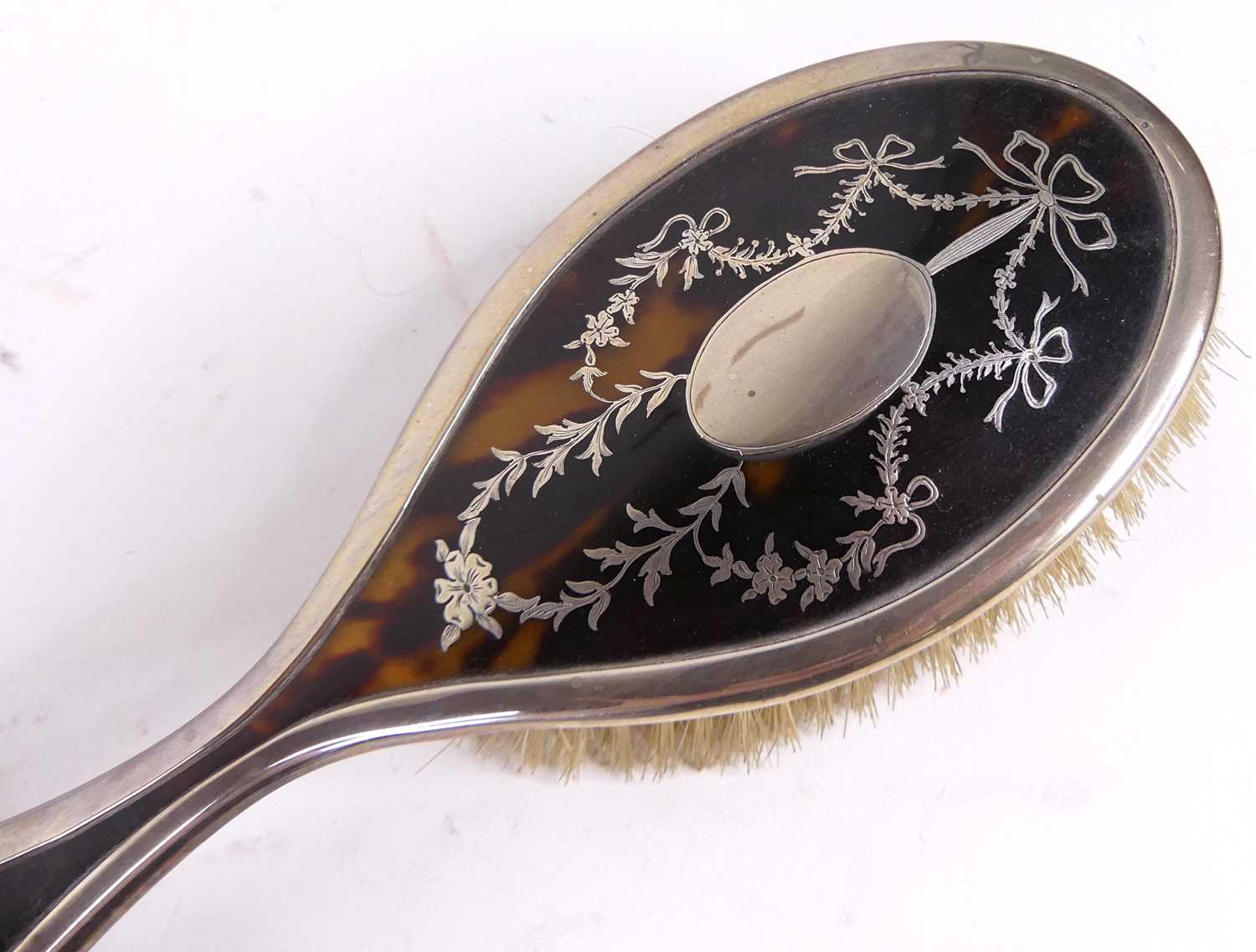 A George V silver clad tortoiseshell and piquet worked dressing table brush set comprising two - Image 2 of 2