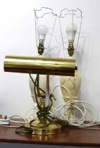 A brass banker's desk lamp, height 29cm, together with a pair of polished hardstone table lamps (3)