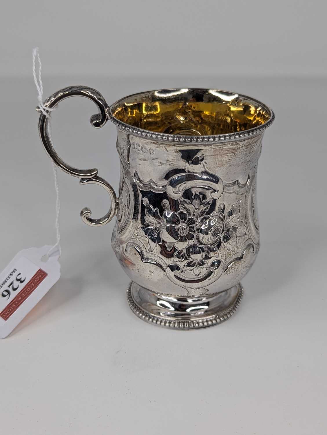 A Victorian silver christening tankard, of bell shape, having floral repousse decoration, - Bild 3 aus 5