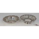 A late Victorian silver bonbon or sweetmeat dish of pierced circular form on a domed foot,