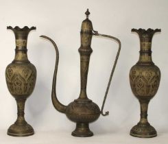 An Indian copper coffee pot of large proportions, height 90cm, having engraved foliate decoration,