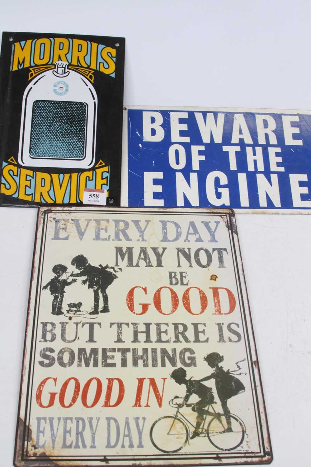 An enamel on metal Morris Service advertising sign, 26x17cm, together with two other metal signs