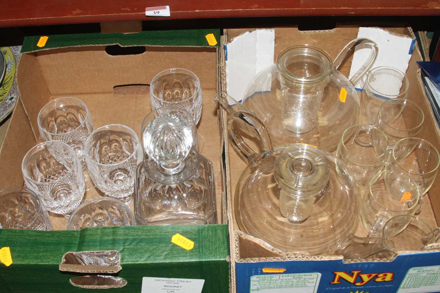 Two boxes of glass ware to include a set of seven Waterford Crystal Colleen pattern drinking glasses