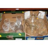 Two boxes of glass ware to include a set of seven Waterford Crystal Colleen pattern drinking glasses