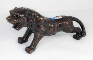 A bronzed metal model of a tiger, length 31cm