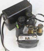 A Konica C35 automatic film camera; together with a pair of Swift Belmont Deluxe 8x40 wide field