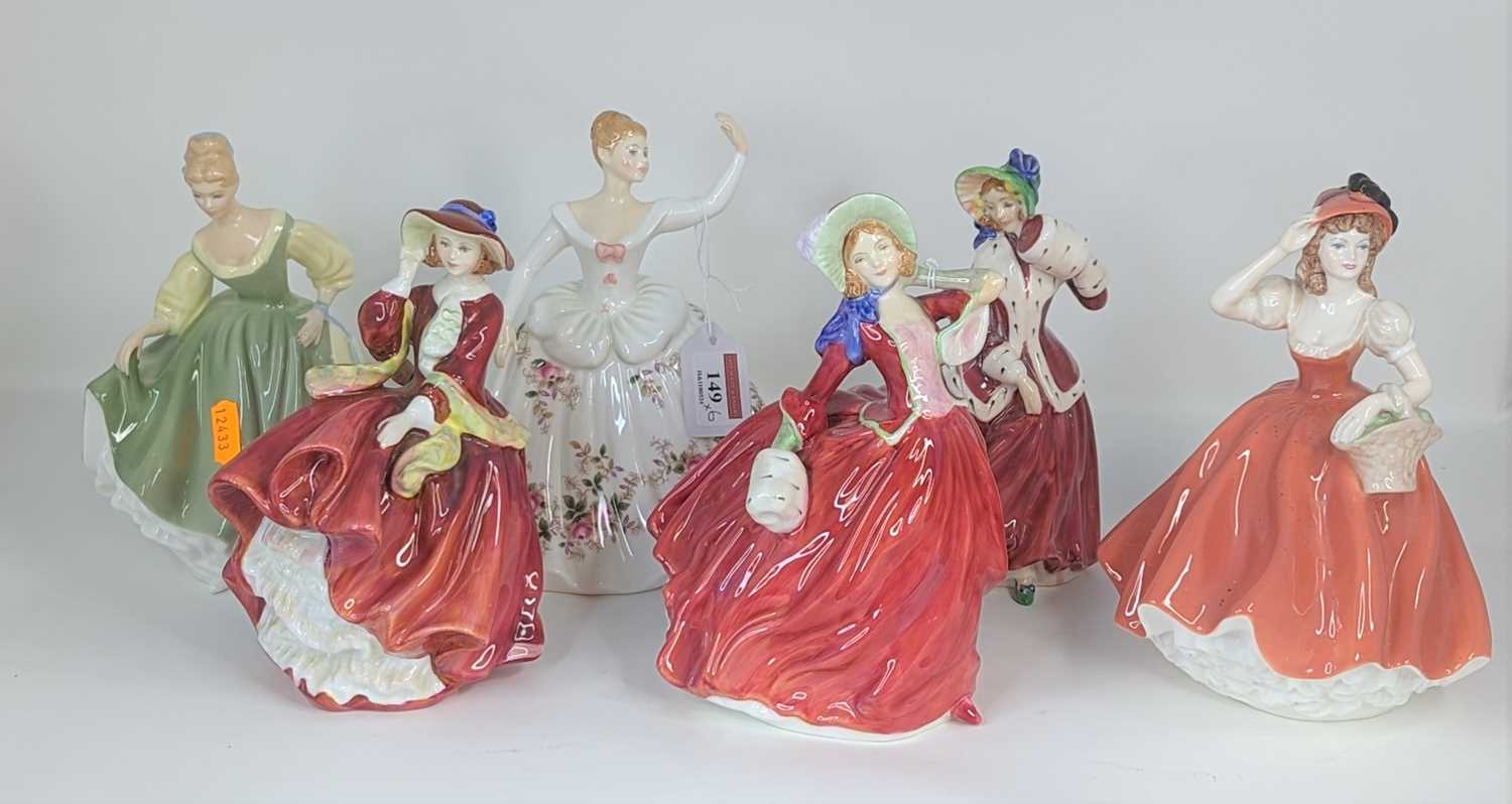 A collection of six Royal Doulton and Coalport figures of ladies to include Christmas Morn and