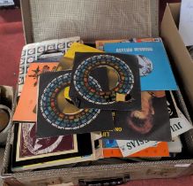 A collection of vintage vinyl 7" singles to include David Bowie - Life on Mars, Bee Gees - Night