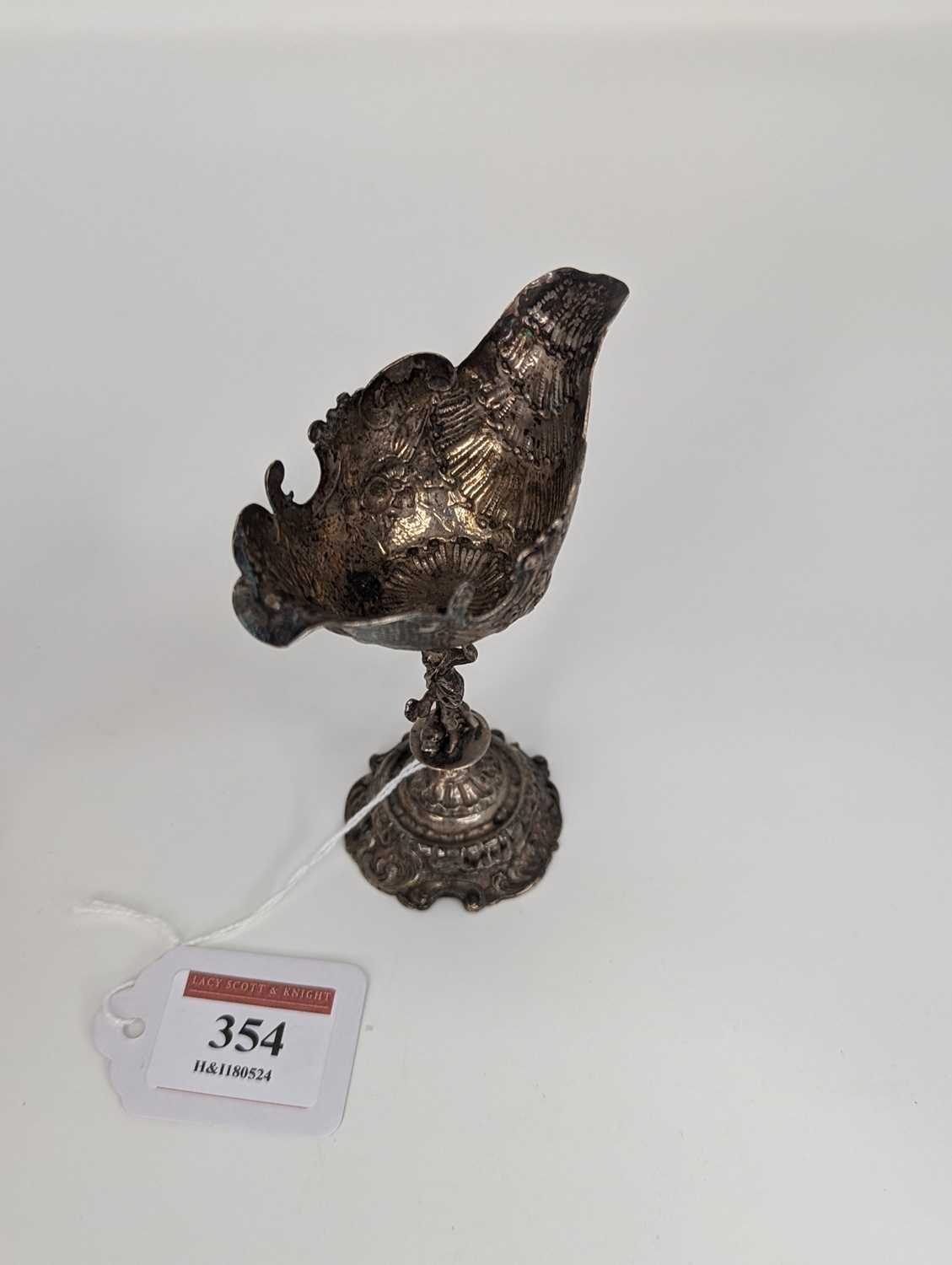 A pair of late 19th century continental white metal open salts, each having an embossed shell shaped - Image 3 of 3