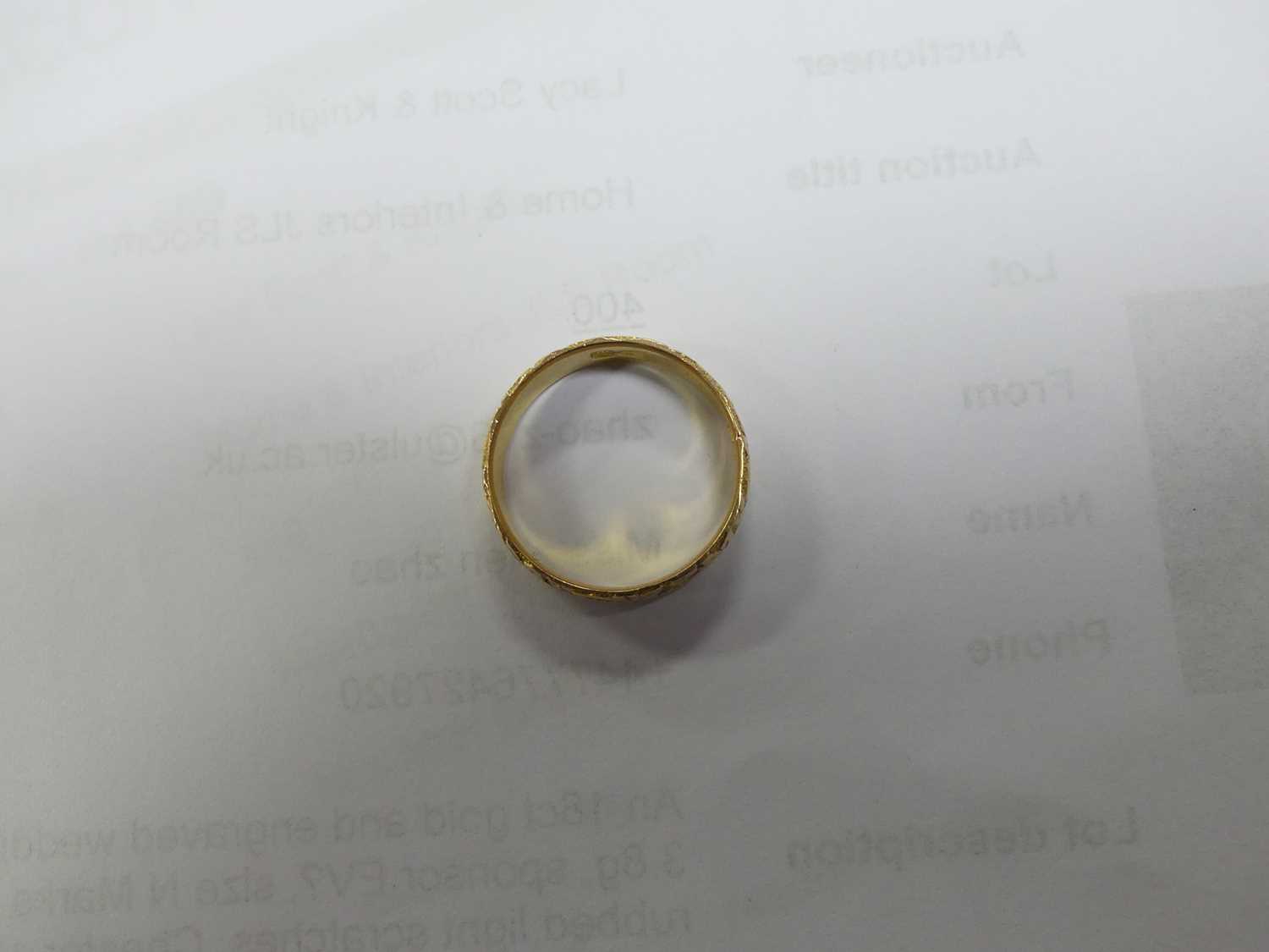 An 18ct gold and engraved wedding band, 3.8g, sponsor EV?, size N Marks a bit rubbed,light - Image 5 of 5