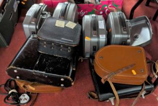 A Bolex Paillard vintage projector, together with three others, and various cine cameras