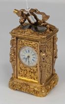 A modern gilt metal cased minuet carriage timepiece, having an enamelled dial with Roman numerals