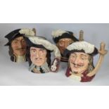 A collection of four Royal Doulton character jugs to include Athos, Aramis, Porthos, and Artagnan (